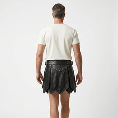 Rear full body view of handmade mens black leather kilt with layered warrior panels for LARP cosplay festival - Rizwards Leather
