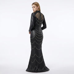 Back side view of black leather chain gown with fishnet mesh back panel, high neck collar, studded rivets, long sleeves, and fishtail maxi dress shape - Rizwards Leather
