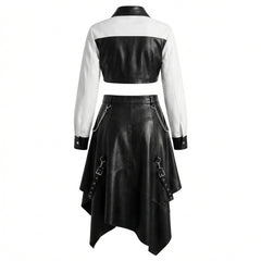 black and white leather two piece skirt set with crop top and handkerchief hem skirt with chains and straps on white background