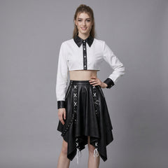 woman wearing black and white leather two-piece skirt set with crop top and handkerchief-hem skirt.