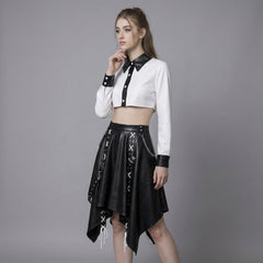 woman wearing black and white gothic skirt set with crop top