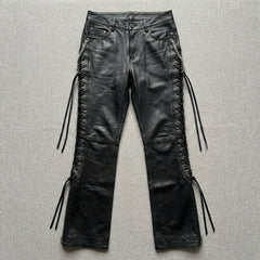 Women’s gothic black leather pants with adjustable side laces and slim biker style