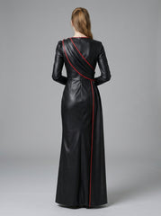 Back view black leather dress with red trim, long sleeves, rear zipper, asymmetrical drape, and floor length gown silhouette - Rizwards Leather
