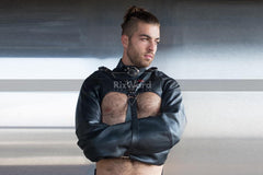 a man wearing a bolero strait jack made with leather