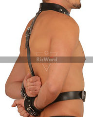 side view of person wearing back handcuffs with neckcollar