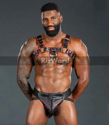 Model wearing a sleek BDSM leather harness-Step into dominant territory with this bondage chest harness built to impress. Pair it with our premium leather jockstrap for pure seduction.