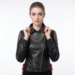 Women’s black leather gothic cyberpunk biker jacket back view with silver chain draping, studded rivets, and red lace-up details