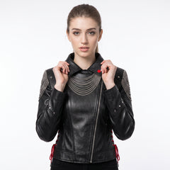 Women’s black leather gothic cyberpunk biker jacket back view with silver chain draping, studded rivets, and red lace-up details