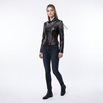 Women’s black leather gothic cyberpunk biker jacket back view with silver chain draping, studded rivets, and red lace-up details