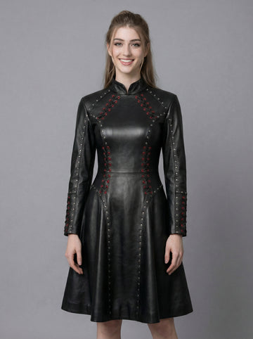 Women’s black leather gothic dress with high neck, long sleeves, fitted waist, and flared skater skirt in twirl pose