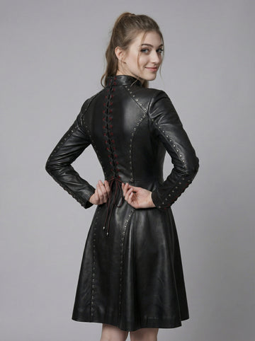 Women’s black leather gothic dress with high neck, long sleeves, fitted waist, and flared skater skirt in twirl pose