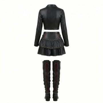 woman wearing black gothic leather skirt set with cropped top jacket and studded mini skirt