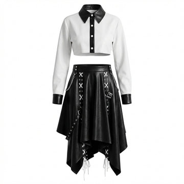 woman wearing black and white leather two-piece skirt set with crop top and handkerchief-hem skirt.