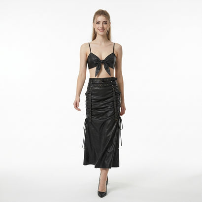 Women’s black leather two-piece outfit with tie-front bralette top and long ruched skirt.