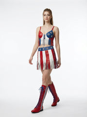 Woman wearing a dress with American flag design and red boots on a white background