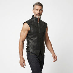 Men’s sleeveless black leather waistcoat featuring a tapered hem, metal zipper, and subtle shoulder hardware.