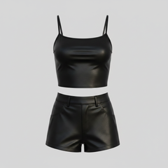 Female model wearing a black leather crop top and high-waisted leather shorts with a smooth polished finish.