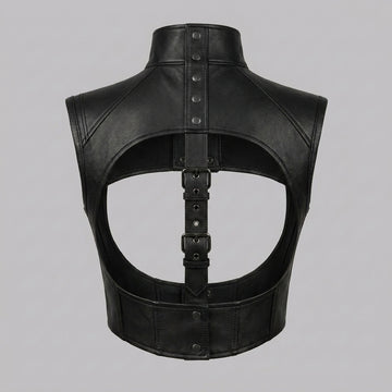 Women’s black leather cropped harness vest with high snap collar, open chest cutout, and structured gothic design.