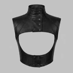 Female model wearing a black leather bolero-style vest with high neck, front snaps, and underbust panel detail.