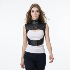 Women’s black leather cropped harness vest with high snap collar, open chest cutout, and structured gothic design.