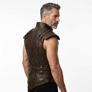Men’s dark brown leather warrior vest with high collar, shoulder armor panels, buckle straps, and studded front details.
