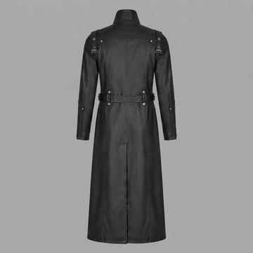 Man wearing a black leather gothic coat with silver buckles on a white background