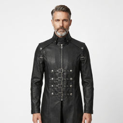 Man wearing a black leather gothic coat with silver buckles on a white background