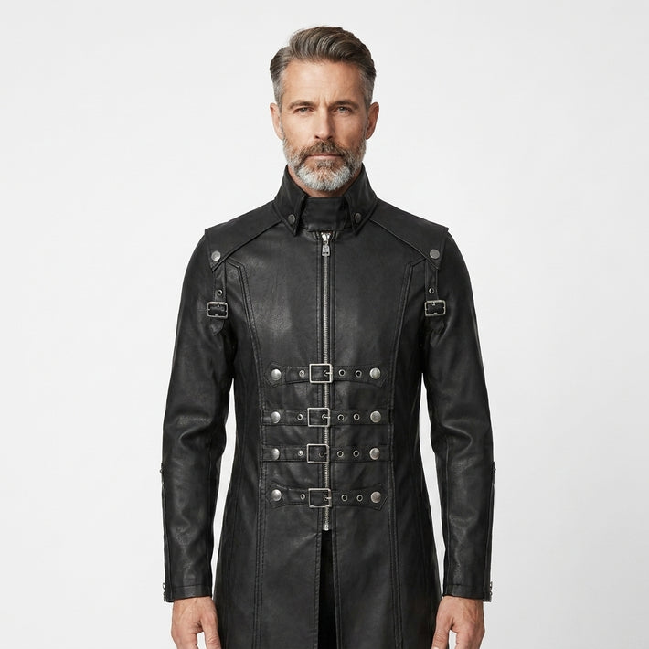 Man wearing a black leather gothic coat with silver buckles on a white background