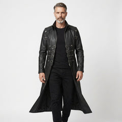 Edgy black leather trench coat with punk gothic styling, silver buckles, high collar, and tailored full-length fit.