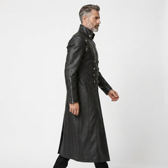 Dramatic ankle-length black leather trench coat with multiple buckle straps, zippered front, and structured gothic design.
