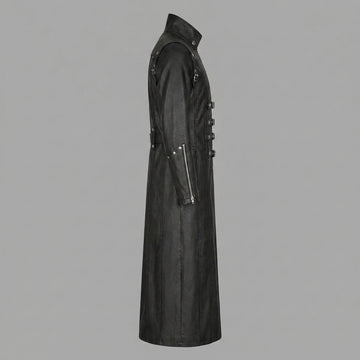 Man wearing a black leather gothic coat with silver buckles on a white background
