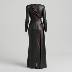 Product back view of black red leather gown with rear zipper, diagonal draped detail, red trim, long sleeves, and elegant gown shape - Rizwards Leather