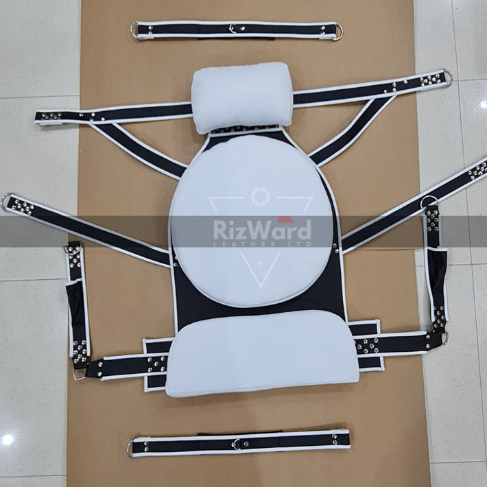 White leather BDSM swing with padded neck and back support