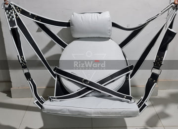 White leather BDSM swing with padded neck and back support